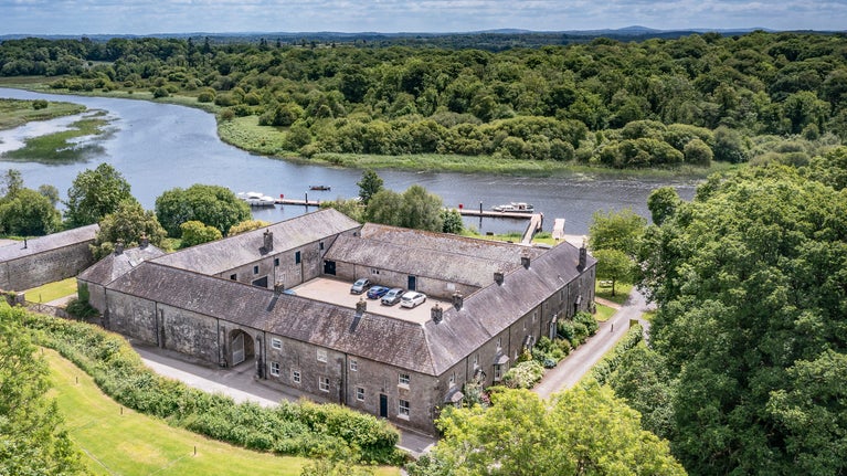 The cluster of holiday cottages and campsite by the water at Crom, County Fermanagh